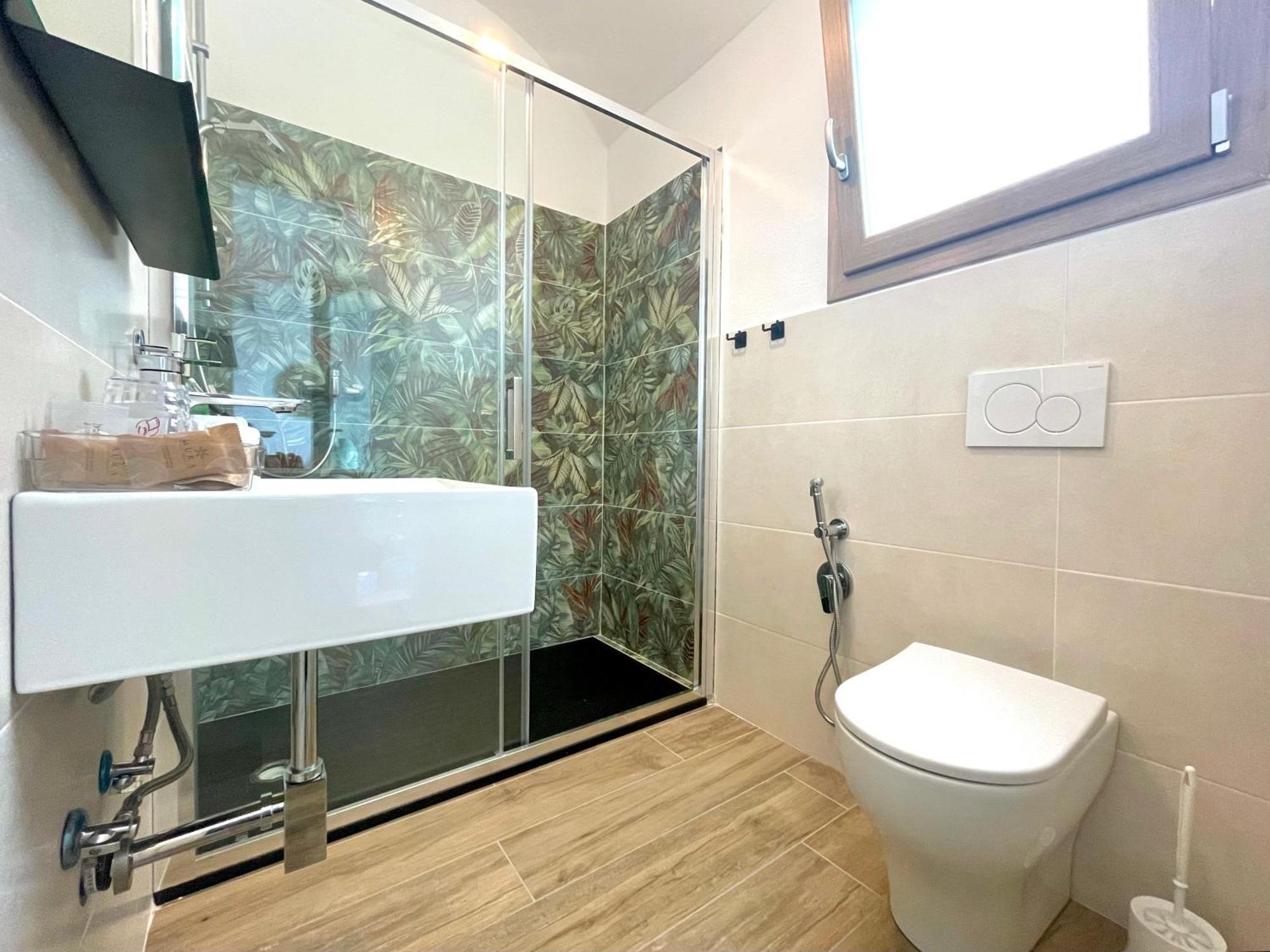 Le Corti Sarde Beach Apartments Bari Sardo Bagian luar foto