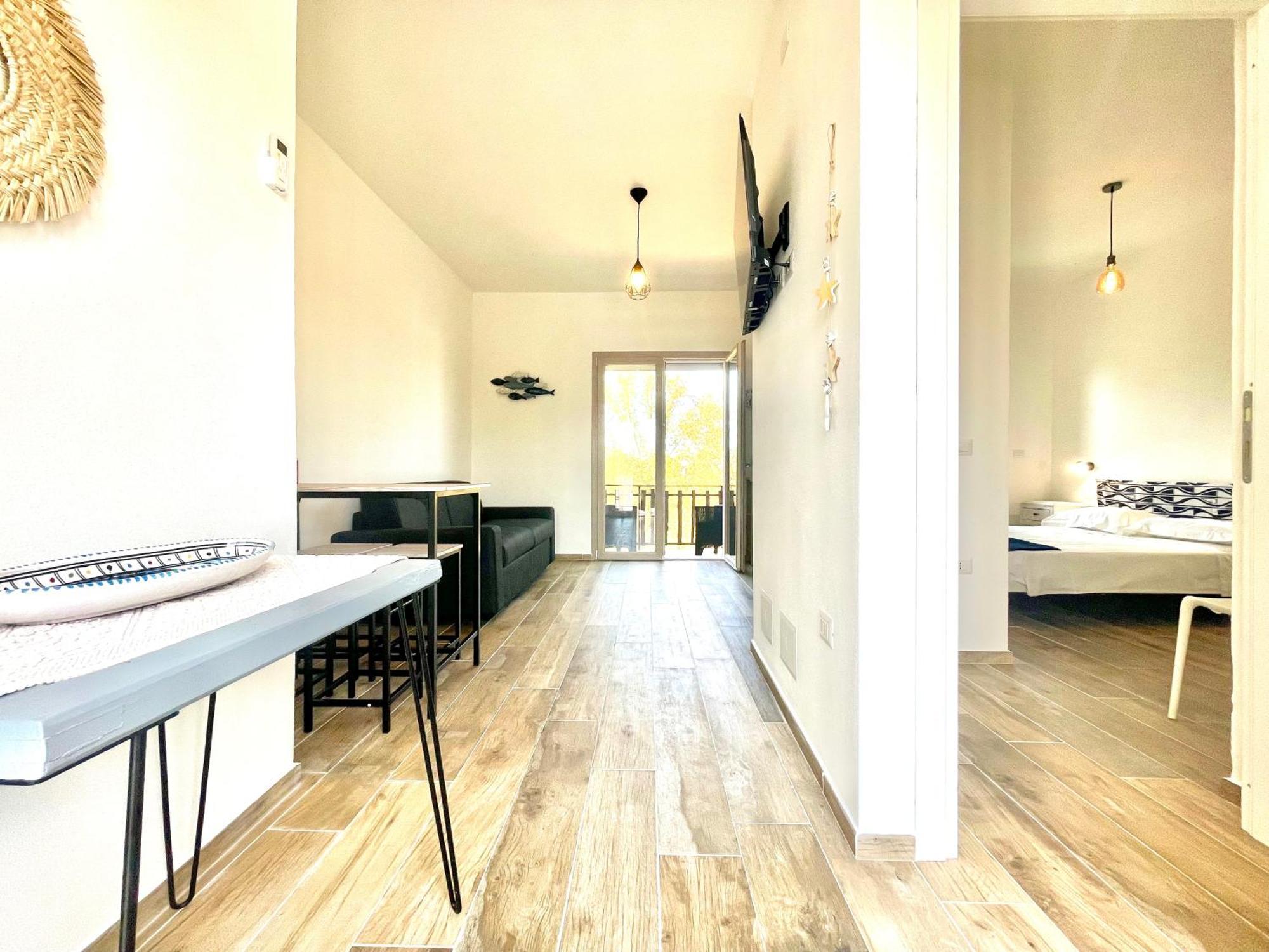 Le Corti Sarde Beach Apartments Bari Sardo Bagian luar foto