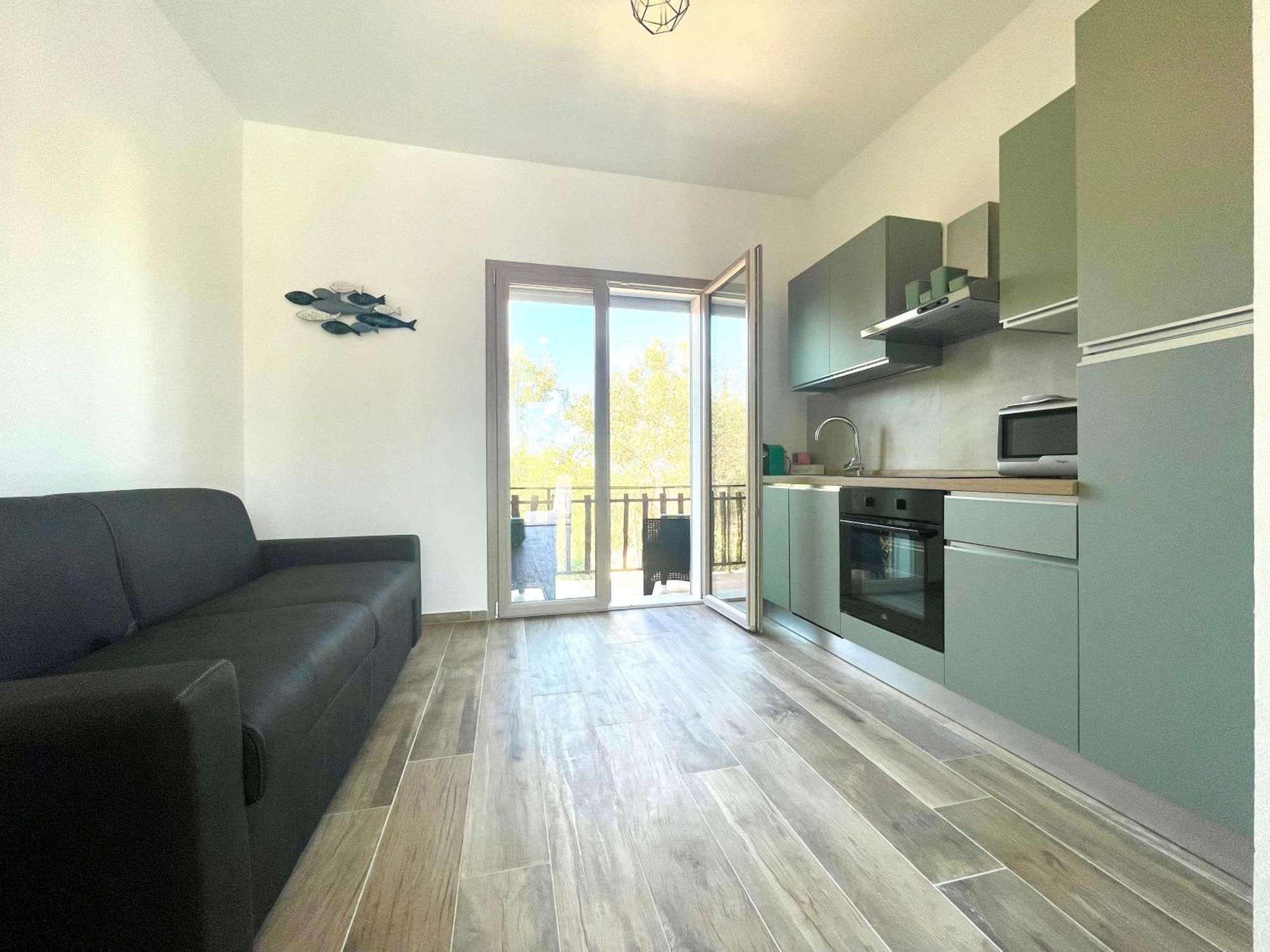 Le Corti Sarde Beach Apartments Bari Sardo Bagian luar foto