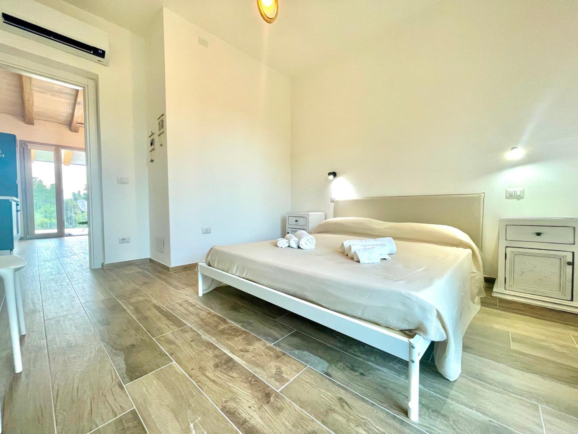 Le Corti Sarde Beach Apartments Bari Sardo Bagian luar foto