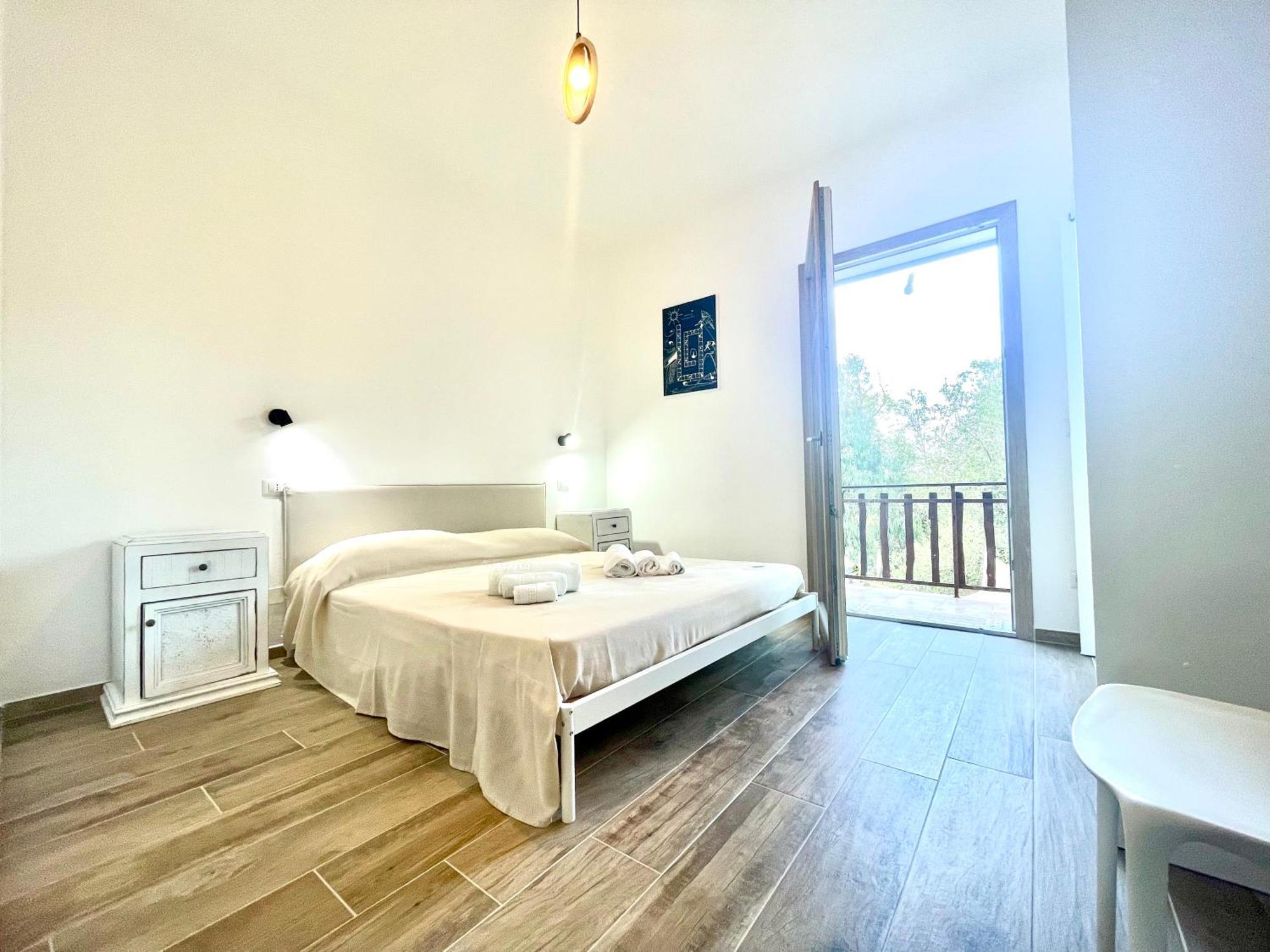 Le Corti Sarde Beach Apartments Bari Sardo Bagian luar foto